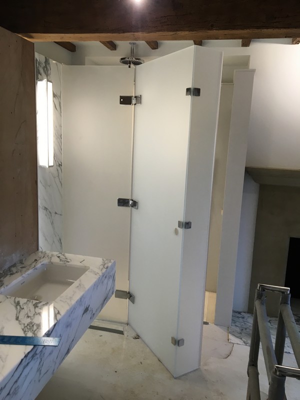 Bespoke frosted glass shower enclosure in Archway luxury bathroom